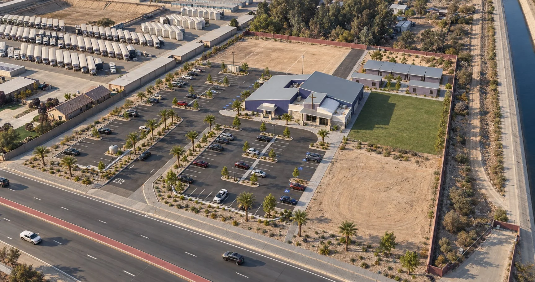 Aerial of the campus with the single-storey units beside the car park